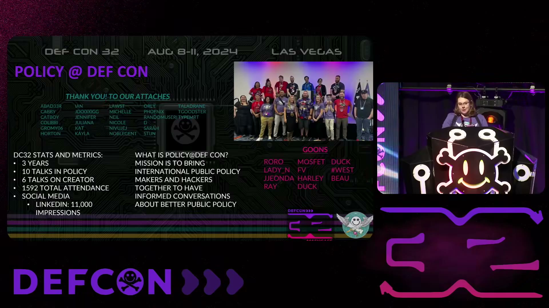 Katie Noble at the DEF CON 32 closing ceremony beside the Policy team photo and 2024 results slide.